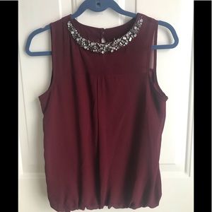 Burgundy sleeveless blouse